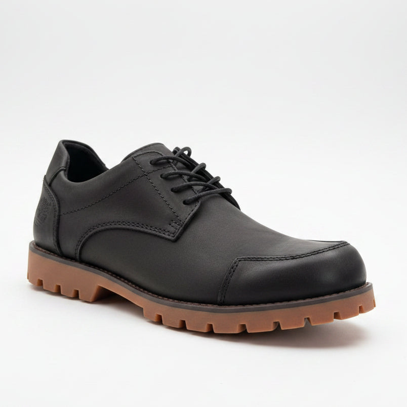 Deep charcoal black nubuck with gum caramel lug sole