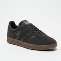 Charcoal grey suede upper with gold branding & gum rubber sole