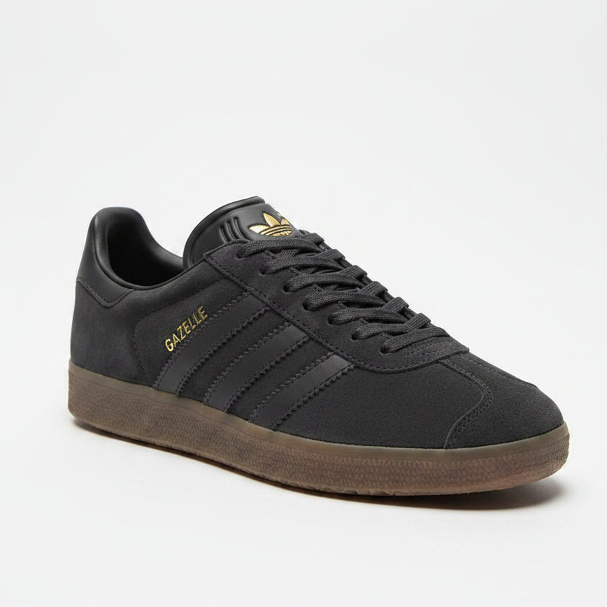 Charcoal grey suede upper with gold branding & gum rubber sole