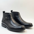 Premium smooth black leather upper with matching monk strap buckle detail and elegant formal finish
