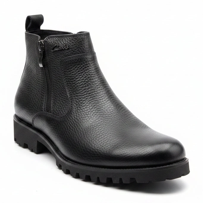 Black pebbled leather upper with side zipper and rugged black outsole