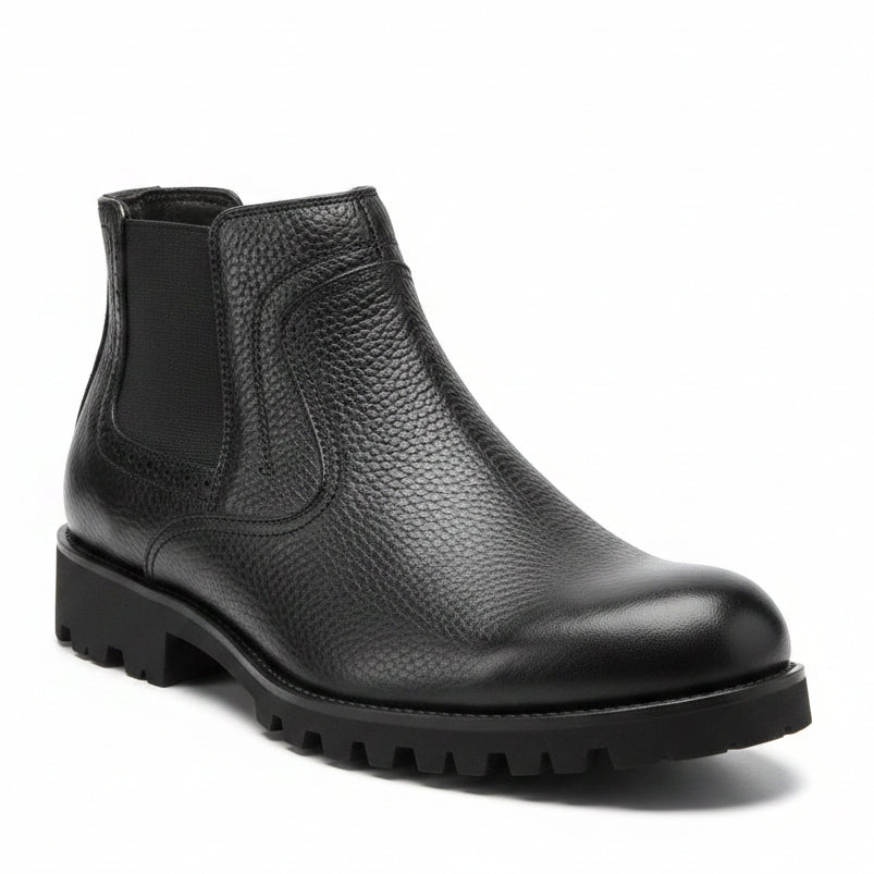 Black pebbled leather upper with matching elastic panels and rugged black outsole
