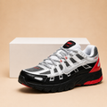 Grey mesh upper with white TPU overlays & Red accent detailing
