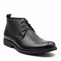 Premium black pebbled leather upper with subtle burnished toe finish and matching outsole